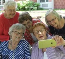 Organize a social group with friends or family or join an established club through your library or local senior groups 1773 40170112 0 14140634 500